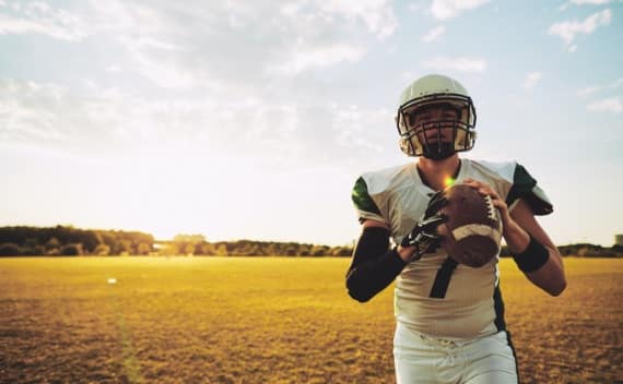 football player at dusk